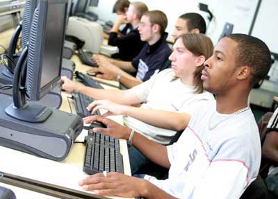 Students learning at computers